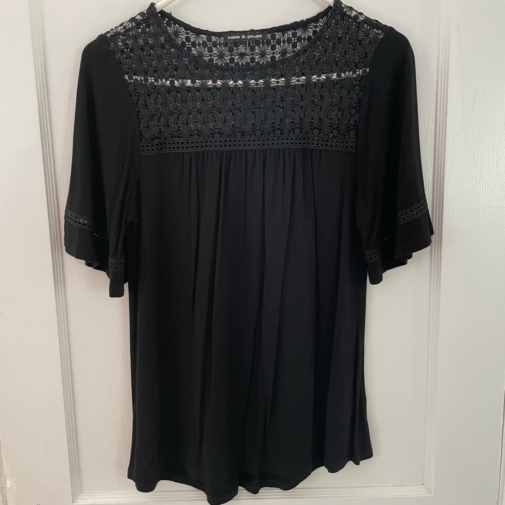 Cable and Gauge black top with crochet neckline.